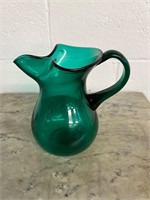 Flawed vintage glass pitcher