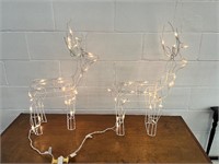 2 small yard light up Christmas deer