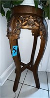 hand carved plant stand
