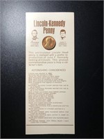 Lincoln Looks At Kennedy Penny On Information Card