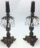 PAIR OF CAST IRON CANDLEHOLDERS WITH PRISMS