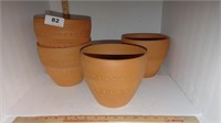 4 clay pots