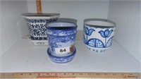 3 blue and white pots, 2 with trays