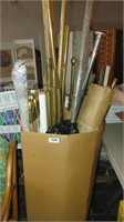 box of assorted curtain rods, bars, bulbs, etc