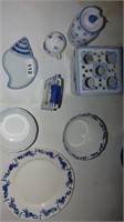assorted blue and white ceramic pieces