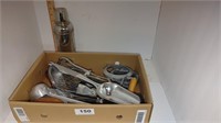 box of cooking utensils and thermos