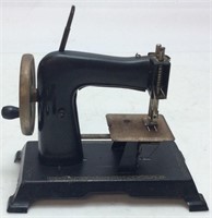 MINIATURE CHILD’S SEWING MACHINE, MADE IN GERMANY