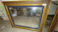 Blue velvet wooden framed mirror