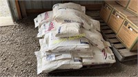 pallet with bags of 575# dry calcium chloride