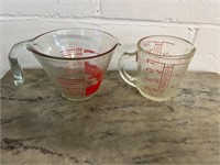 2 vintage red lettering Pyrex measuring cups