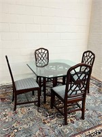 Beautiful heavy glass top table 4 chairs