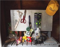 SPRINKLER, LAWN AND GARDEN ON BENCH AND PEGBOARD