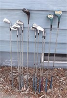 2 SETS OF GOLF CLUBS 1 IS NORTHWESTERN