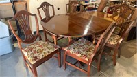 Vintage mahogany dining room table with six