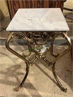 Small fancy French brass side table with a white