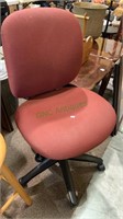Burgundy padded office chair with 5 castor