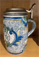 Large hand-painted beer stein with a pewter lid