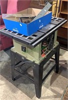 Delta 10 inch table saw with a box of
