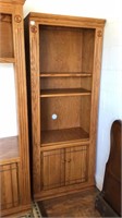 Solid wood bookcase measuring 28 inches wide, 16