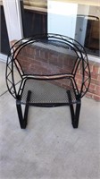 Wrought iron outdoor chair. Seat Measures 20