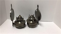 2 wall mount oil lamps, one with flint