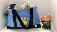 Tote bag with multiple bags inside and a rose
