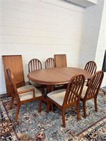 Heavy wambold table 2 leaves 6 chairs