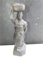 Carved man with child wood sculpture