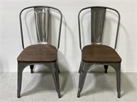 Pair of industrial metal side chairs w/ wood seats