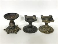 Collection of ornate brass bases