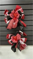 Two handmade valentines bows. Heart needs