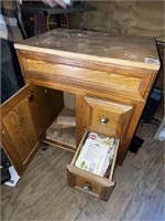 wood cabinet, sandpaper in drawer included