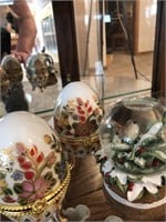 Painted eggs and snow globe