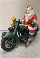 Castiron Santa Riding Motorcycle Clicking front