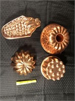 (4) COPPER COLORED MOLDS