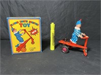 CLOWN RIDING SCOOTER TOY - WIND-UP