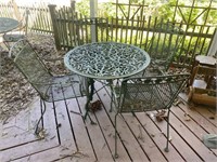 Metal patio table and 4 chairs