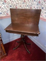 Antique mahogany game table