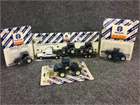 Lot of 4-New Holland 1/64 Scale in Packages