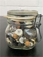 Beautiful unique vintage buttons in vintage jar