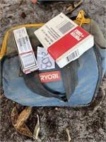 empty ryobi bag, with staples/nails