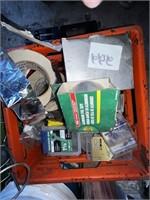 orange crate full of items