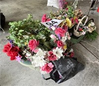 Artificial flowers and wooden cart