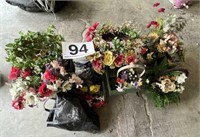 Artificial flowers and wooden cart