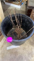 PLASTIC PLANTER WITH BARBED WIRE PIECES AND CALF