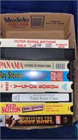 VHS MOVIES AND BOX OF CANDLES