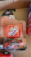 THREE TONY STEWART COLLECTIBLES AND A BIG A TRUCK