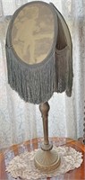 Metal lamp with fringe shade