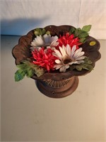 cast iron pedestal dish with flowers