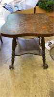 Oak side table with claw and ball feet
